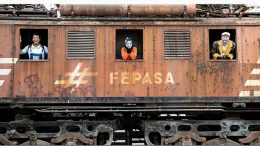 imagem de um carro de trem da FEPASA, nas janelas três personagesns sao vistos.