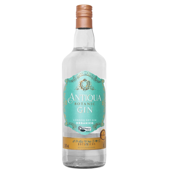 garrada do gin Antiqua, garrafa transpaarente com rótulo em azul claro e uma faixa horizontal dourada