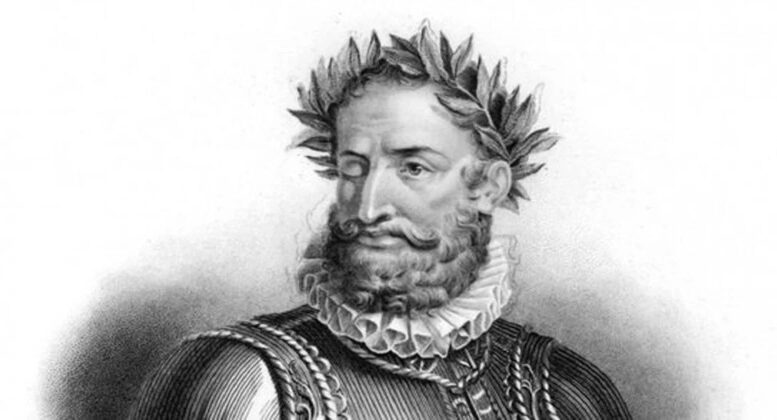 desenho em preto e branco de Luis de Camões, com coroa de louros e o olho cego sem tampão.